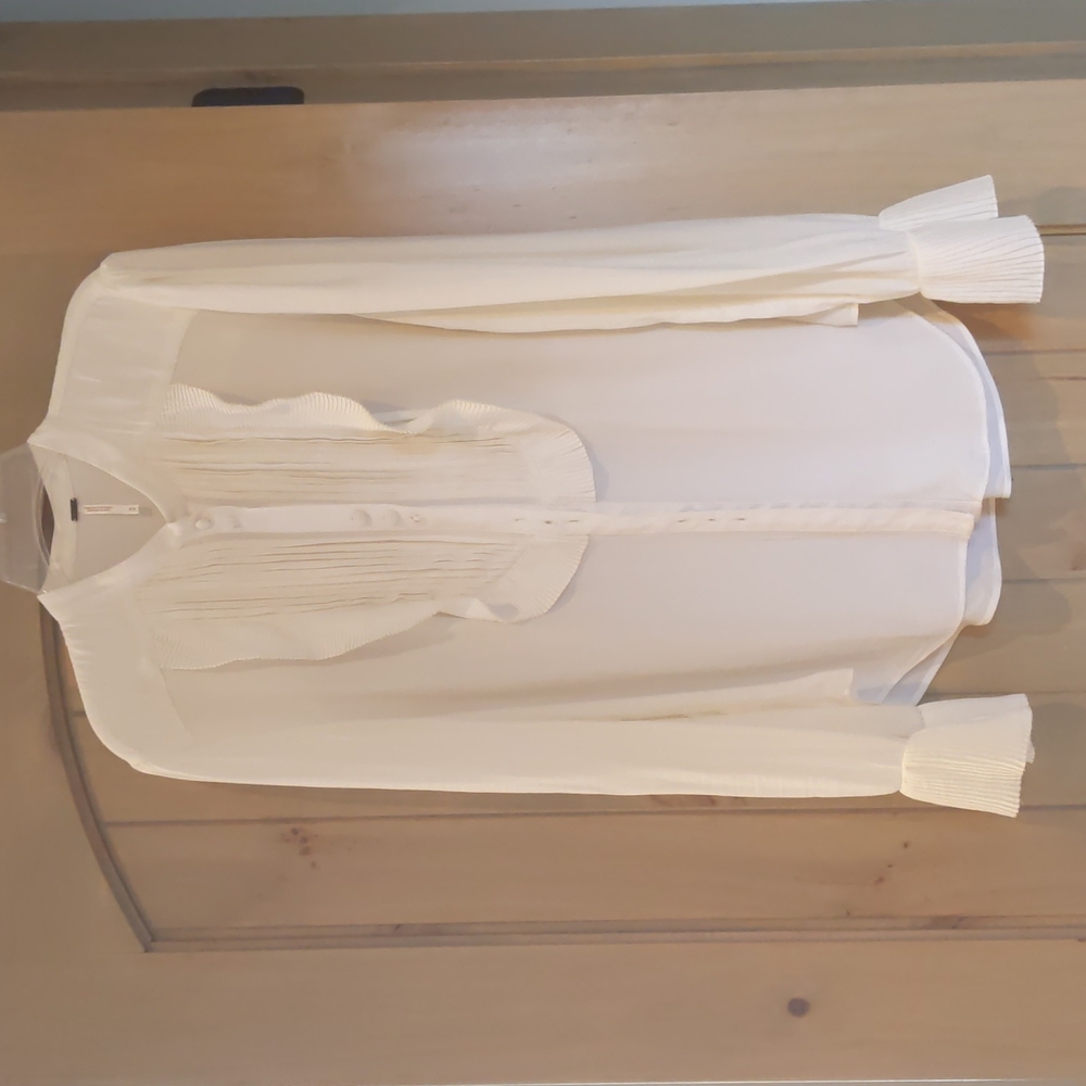 Free People women's Medium size long sleeve blouse.